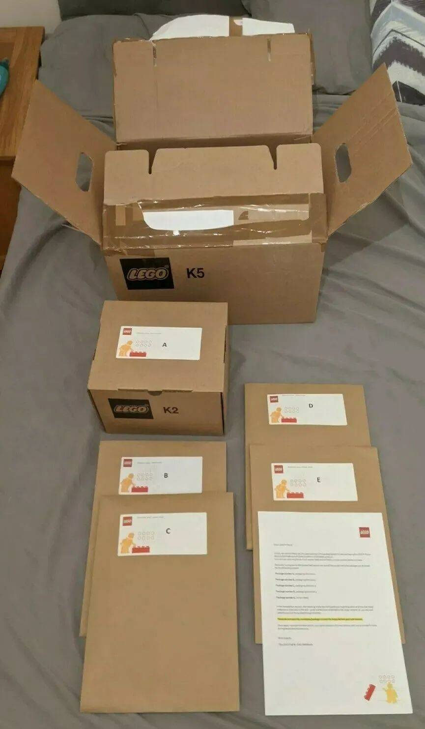 未来会用纸盒来挑零件墙？乐高集团正在试水品牌店中的塑料杯和自选人仔包装替代品 -1