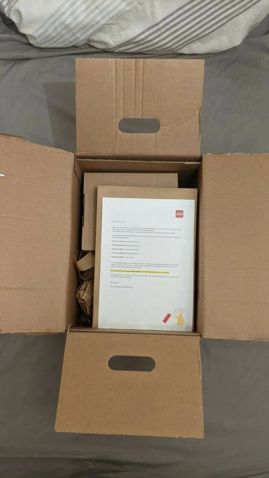 未来会用纸盒来挑零件墙？乐高集团正在试水品牌店中的塑料杯和自选人仔包装替代品 -1